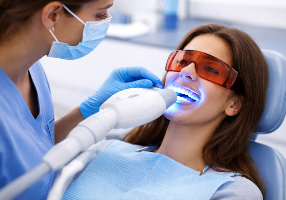 Professional teeth whitening treatment in Oakville using advanced LED technology for a brighter smile